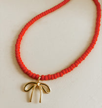 Load image into Gallery viewer, Coral Beaded Bow Necklace
